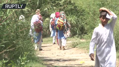 Afghan refugees reach Pakistan’s Khazana camp as Taliban takes over