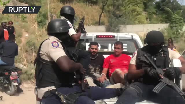 Heavily armed Haitian police exchange fire with suspects in president's assassination