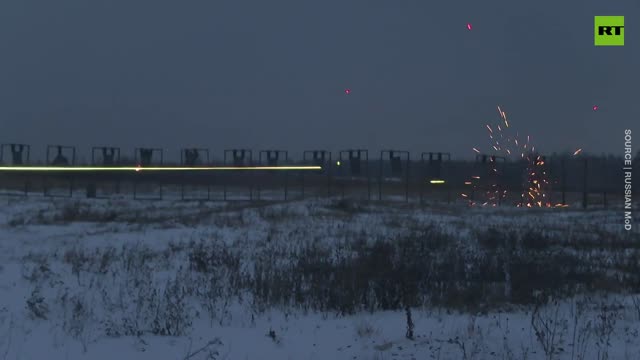 Tracers pierce the air as Russia’s mobilized troops practice night shooting