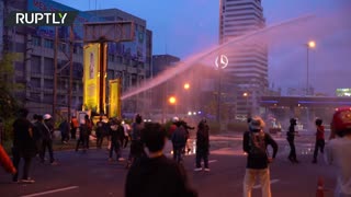 Thai protesters clash with police near PM's residence in Bangkok