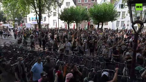 Pro-Palestinian activists protest at the University of Amsterdam over ties with Israel