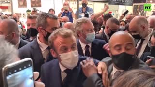 Macron hit by egg-shaped projectile at catering & food fair in Lyon