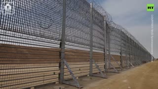 65km-long fence DIVIDES Gaza Strip and Israel