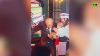 Biden BITES babies at White House Halloween party