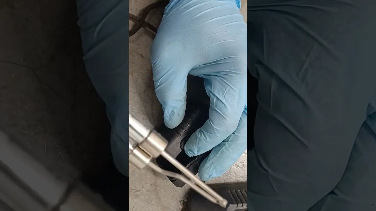 soldering a piece of wire back to the circuit board