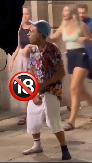 Creep Alert: Man fondling himself in public in Barcelona gets a lesson to the back.