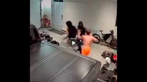 Dude takes on two home invaders at once