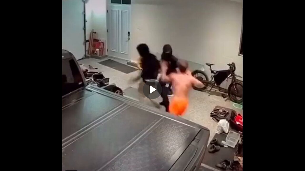 Dude takes on two home invaders at once