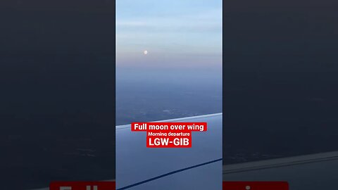 Full Moon over wing after Departure #shorts