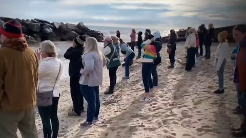 Liberal white women shout at a lake in protest of Trump's victory