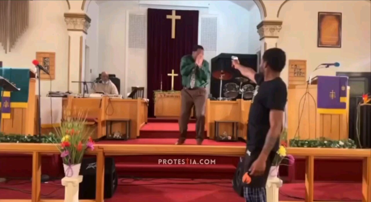 shooter try to take out the priest but his gun jams