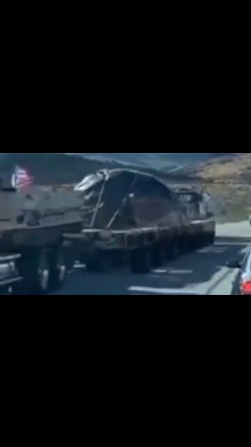 It looks like a UFO is being transported into Area 51