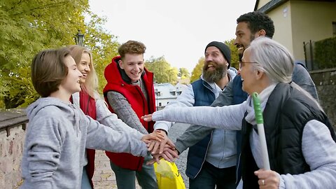 diverse group of happy community service volunteers stacking hands together outdoor SBV 346774104 HD