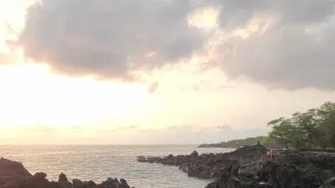 Splashy Wave Action And A Sunset In Hawaii