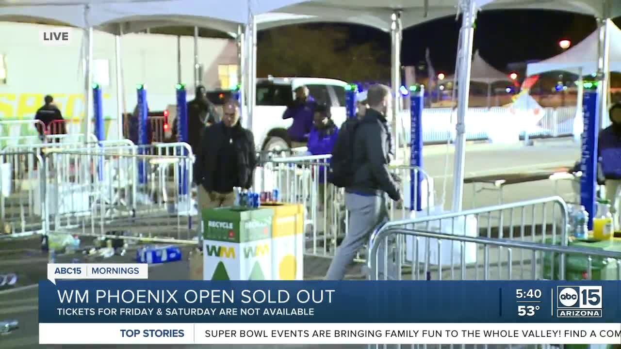 Attendees appear to rush the gates at WM Phoenix Open