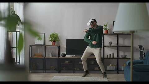 young man is using virtual reality for entertainment singing and dancing in room ha SBV 346411392 HD