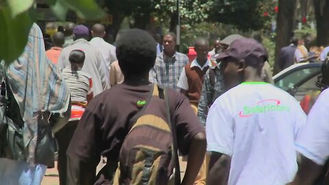 pedestrians walk on the streets of nairobi kenya SBV 307927437 HD