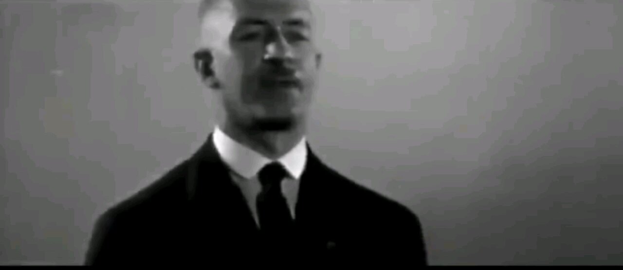 Hitler and nazi economist Gottfried Feder explaining the nazis campaign slogan. "End debt usury".