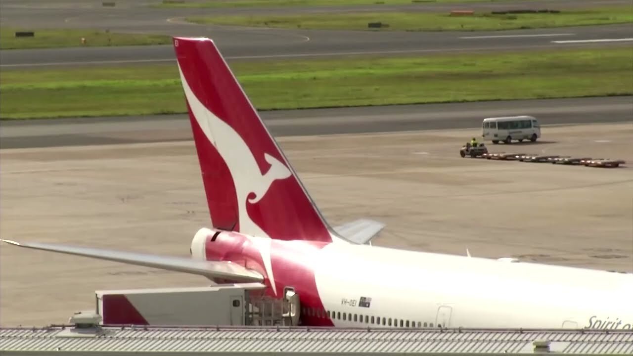 Qantas sees profits dip as fares fall, announces share buyback | REUTERS