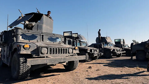 Iraq deploys armored vehicles to Syria border amid escalation