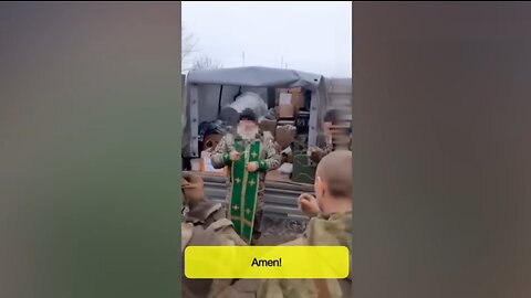 Russian Orthodox priest delivers a sermon to a soldiers going to the frontline