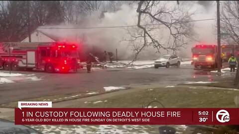 1 in custody following deadly house fire