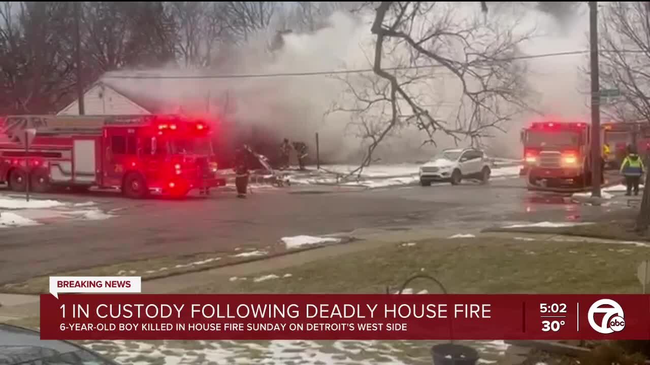 1 in custody following deadly house fire