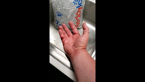 Flushing ouy my knife cut .