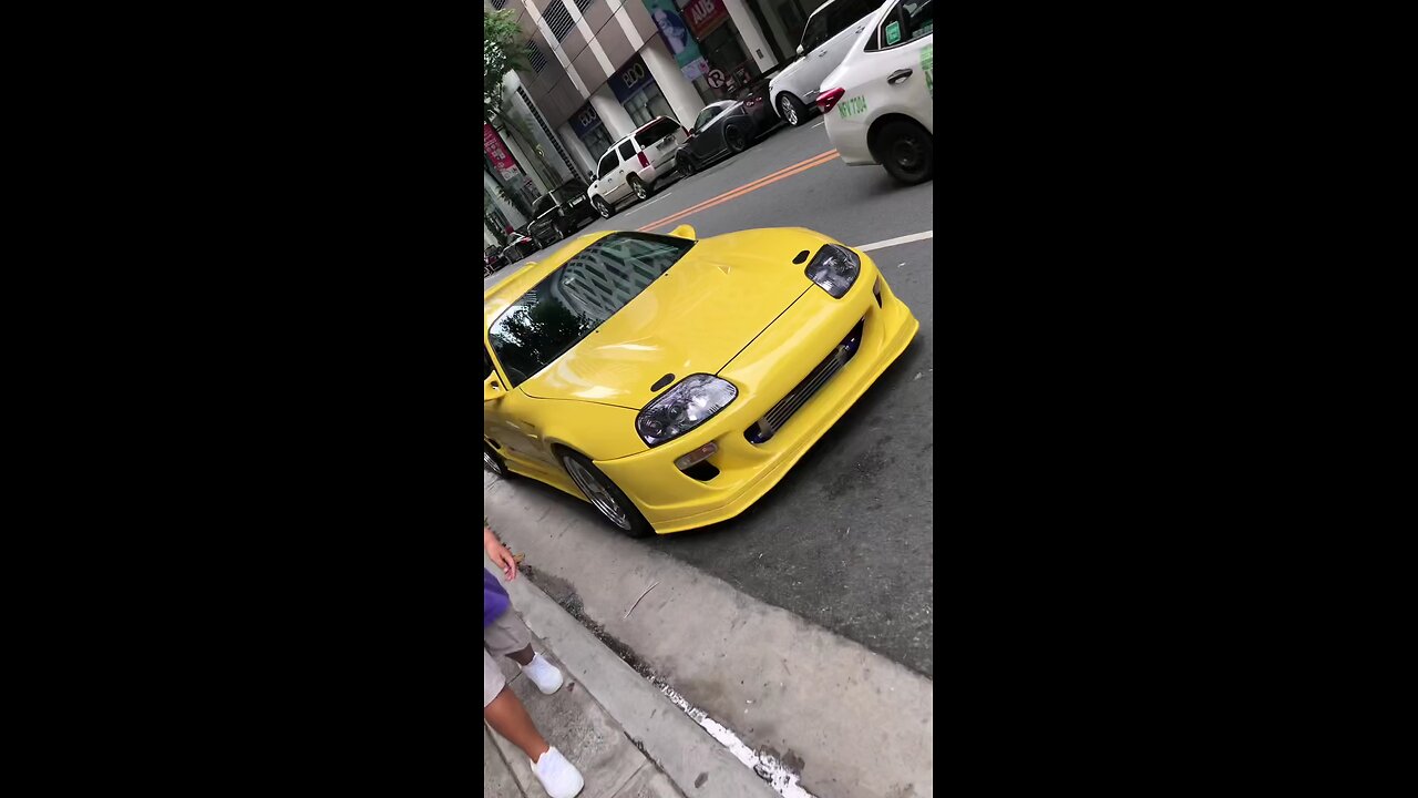 Golden Speedster: Stunning Yellow Toyota Supra Showcase"