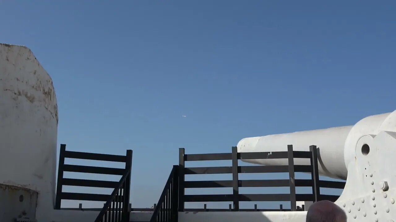 Plane Flies in Front of Cannon at Gibraltar