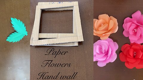 Wall hanging with paper flowers.wall hanging ideas