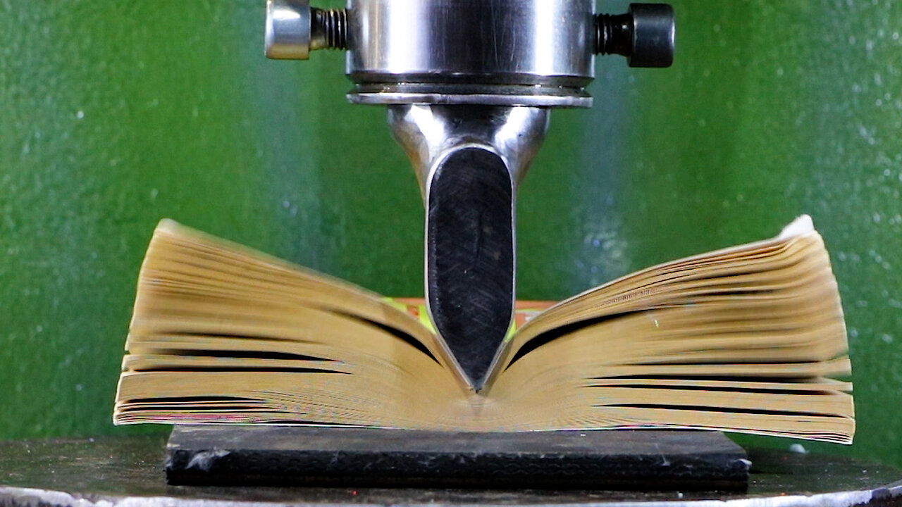 Cutting Book With Hydraulic Press