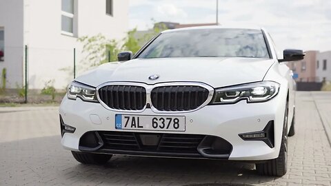 front of a modern car bmw 3 series in a suburban area SBV 338734544 HD