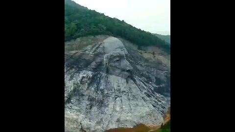 Carved rock statue of Chinese ancients unveiled in central China.