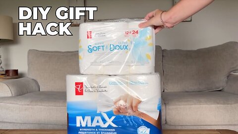 She stacks toiler paper in her living room for this BRILLIANT idea.