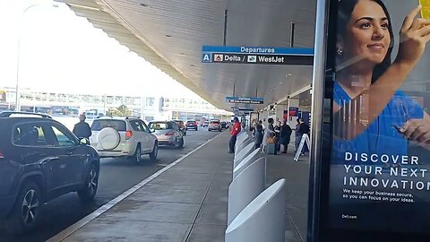 Friday afternoon at Logan airport all is good no one has two hot minutes