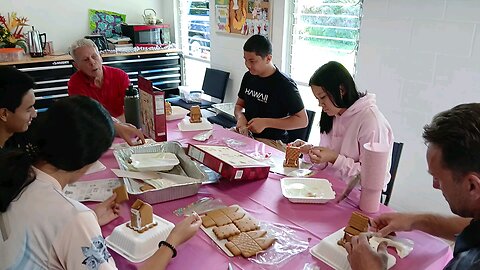 Young Adults building Ginger Bread Houses