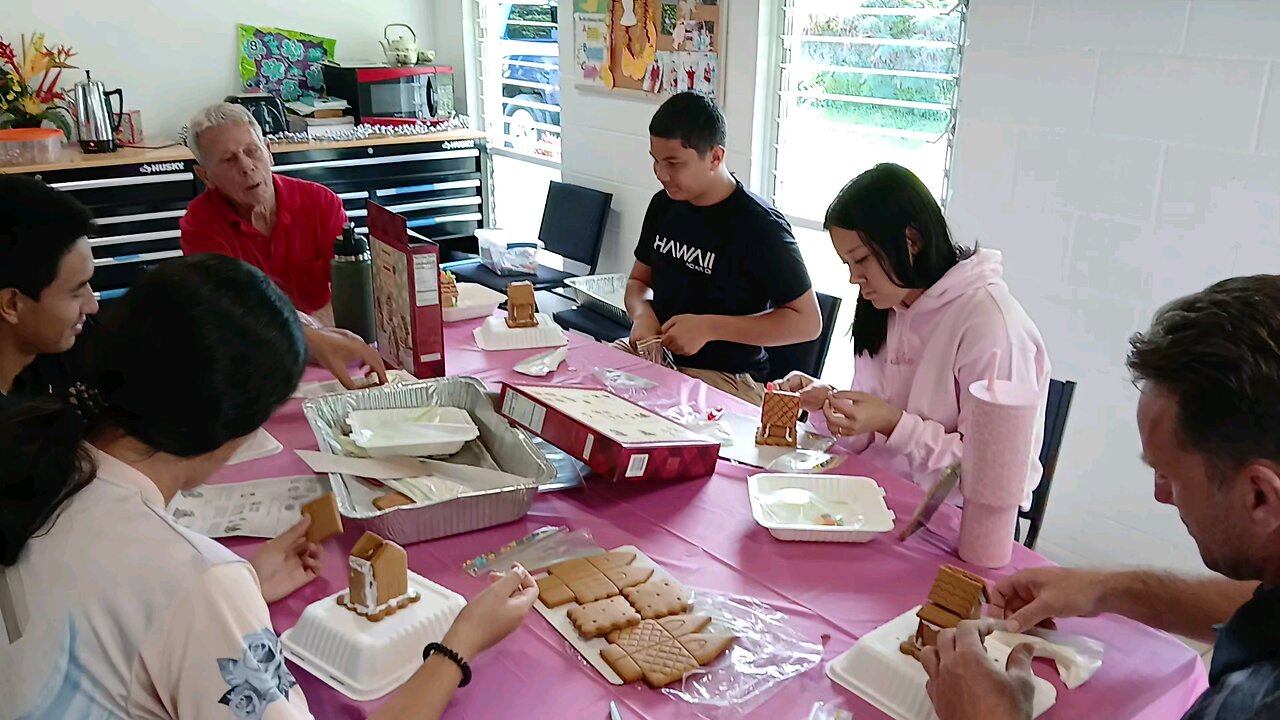 Young Adults building Ginger Bread Houses