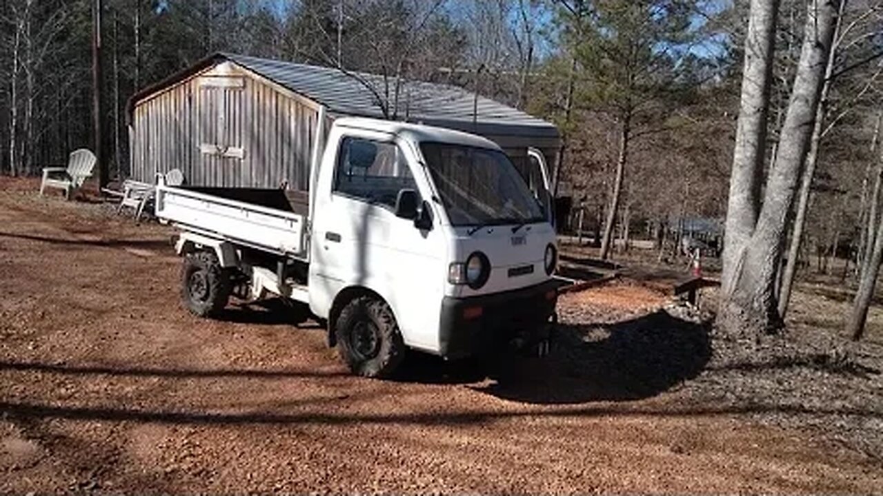 Japanese Kei truck, Suzuki Carry, hauling trash and highway driving.