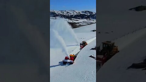 Clearing a three-meter layer of snow in Norway