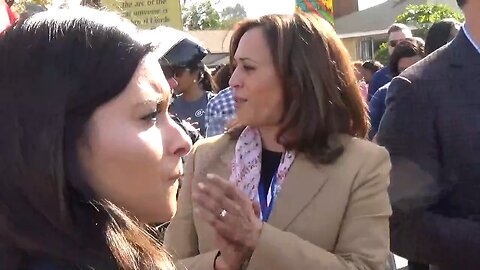 Kamala shouting 'Down down with deportation!' at a 2018 parade in Los Angeles