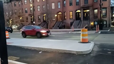 asking people what they think about the bike lane on Tremont Street