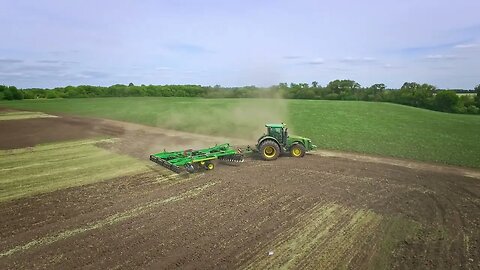 agricultural tractor with trailer plowing agricultural field farm tractor plowing r SBV 318038827 HD