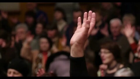 worship hand raised at church during in congregation during service one hand raised SBV 309919273 HD