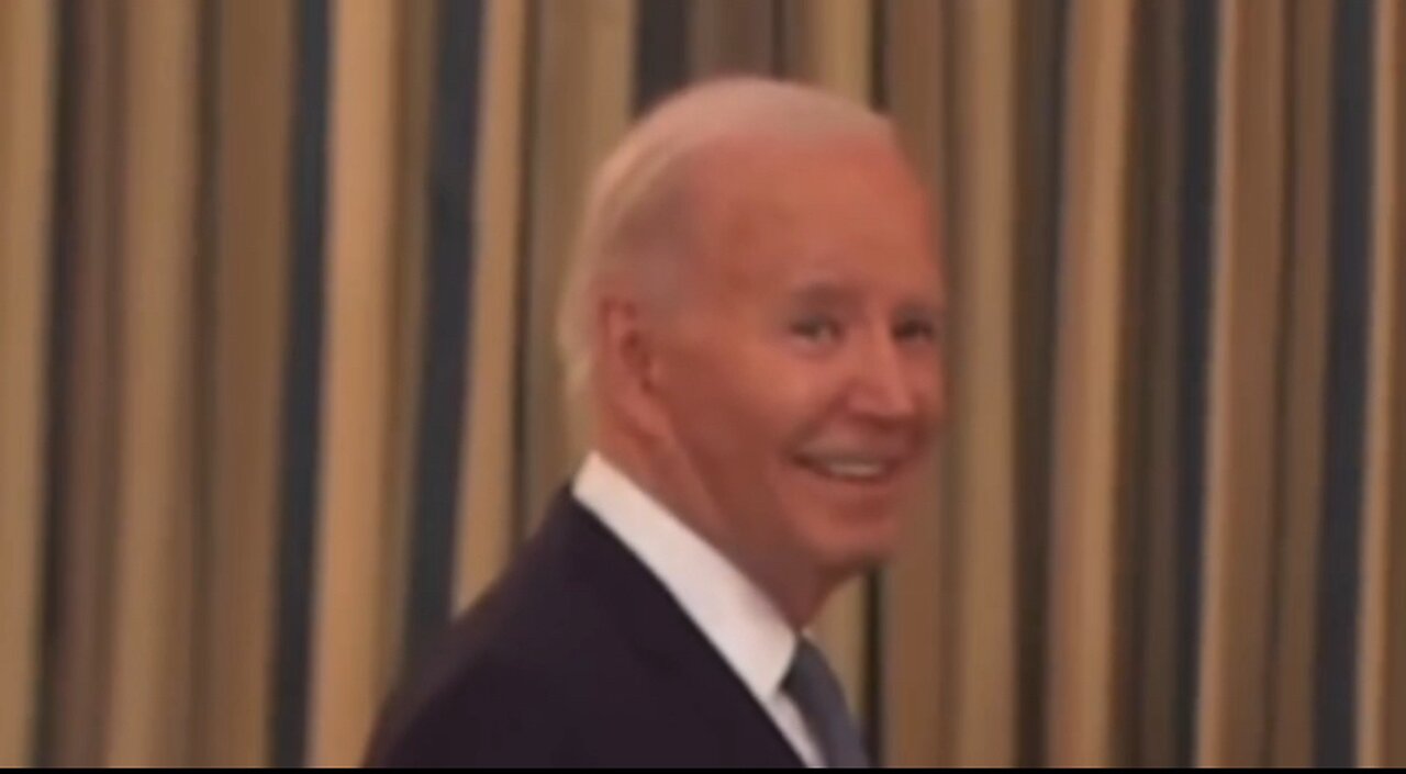 Biden smiles insidiously at the camera when asked about Trump's ‘political prisoner’ comment