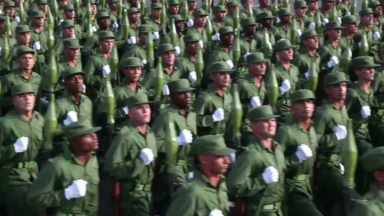 cuban army soldiers marching in military parade on the 50th anniversary celebration SBV 300971856 HD