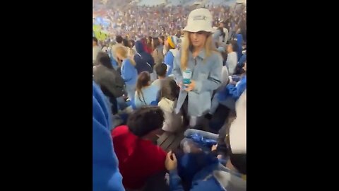 Crazy Blond Bimbo Sucker Slaps A Guy In The Stands At The UCLA Game For No Apparent Reason