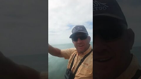 travel Belize fishing a local, from the bank sheepshead