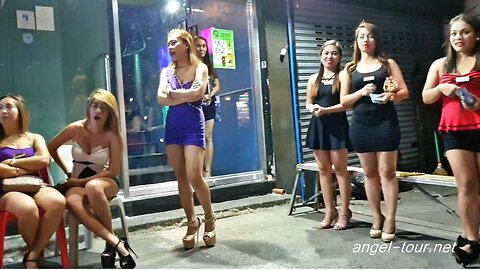 Manila young girls along the street. KTV girls waiting for customers.