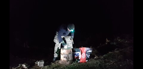 Using the axe the chop wood at night20th Jan 2023